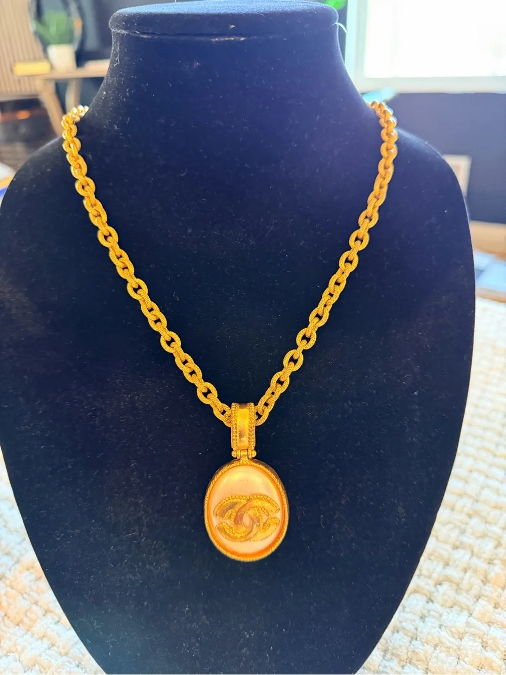 CHANEL Gold and White Oval CC Pendant Necklace